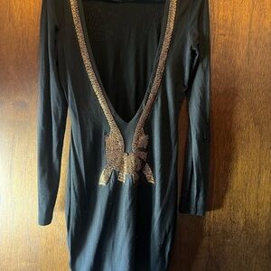 Beaded and backless long sleeve dress
